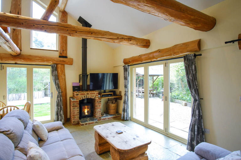 Loxley's Lodge features a luxurious sitting area with a 50 inch TV. The perfect holiday cottage lodge.